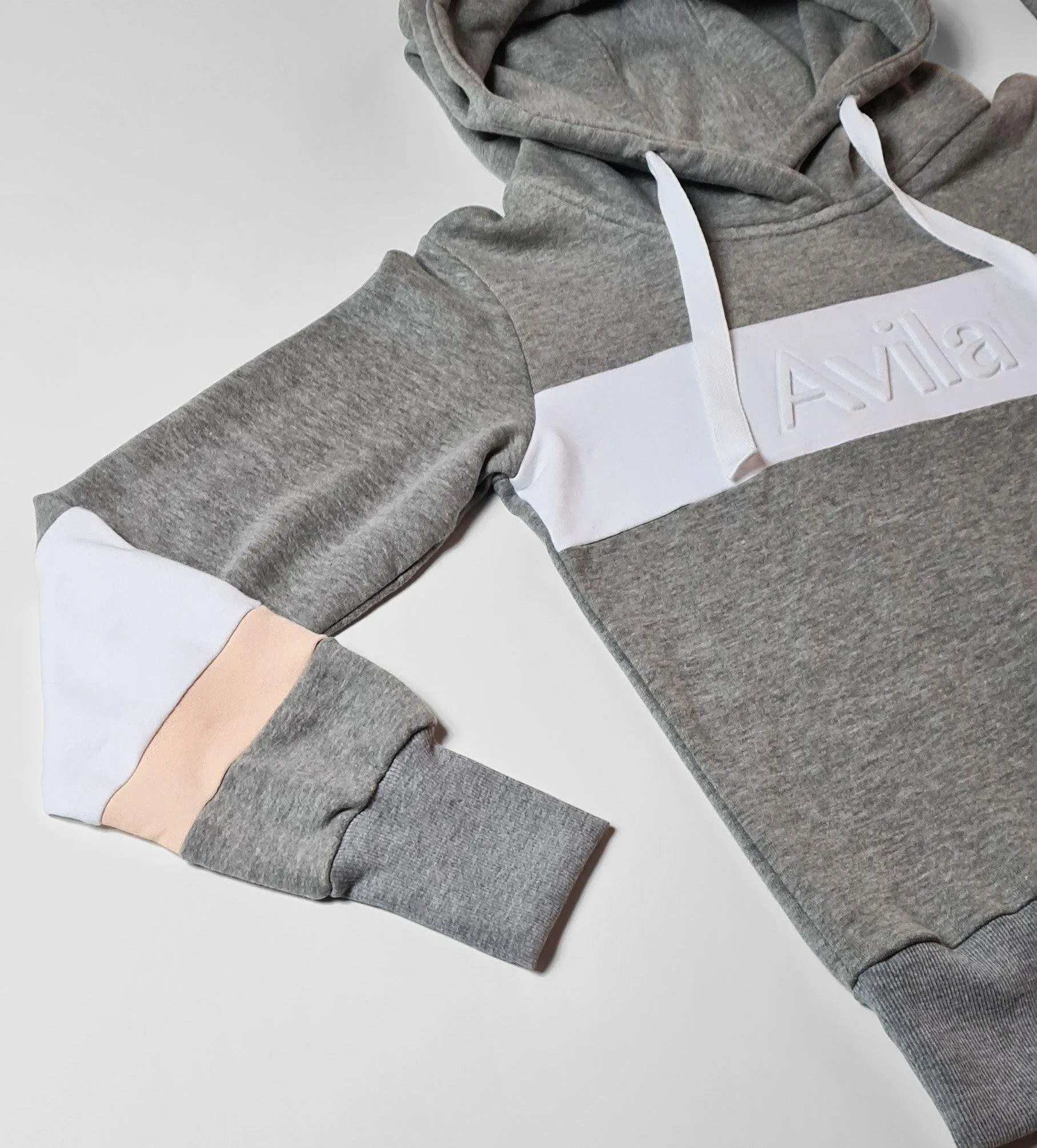 Certainly! An optimized title for an e-commerce product like a hoodie with an embossed logo could be:

Premium Embossed Logo Hoodie - Stylish & Comfortable Unisex Sweatshirt